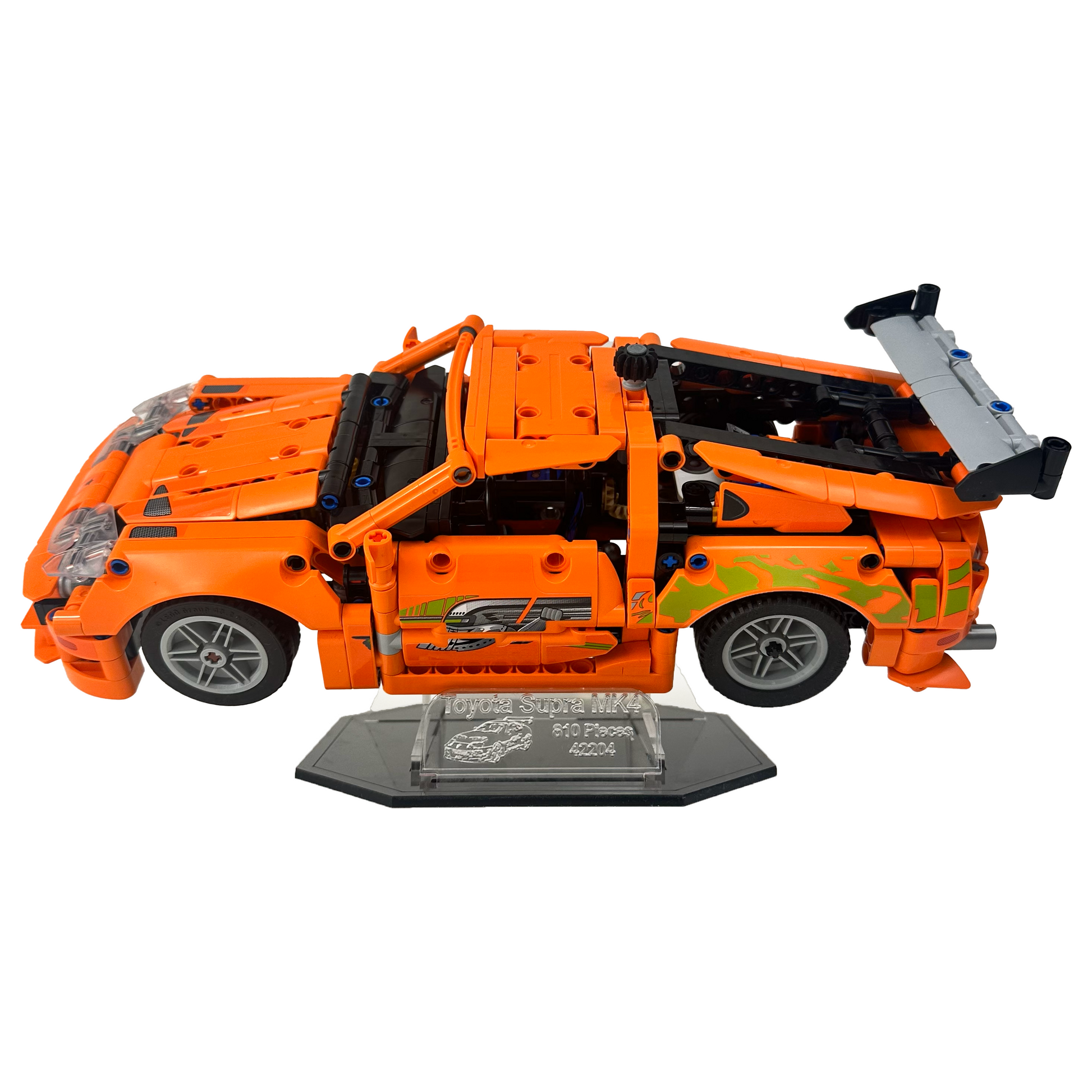 Lego Fast and Furious Toyota Supra MK4 on acrylic display stand with black base plate